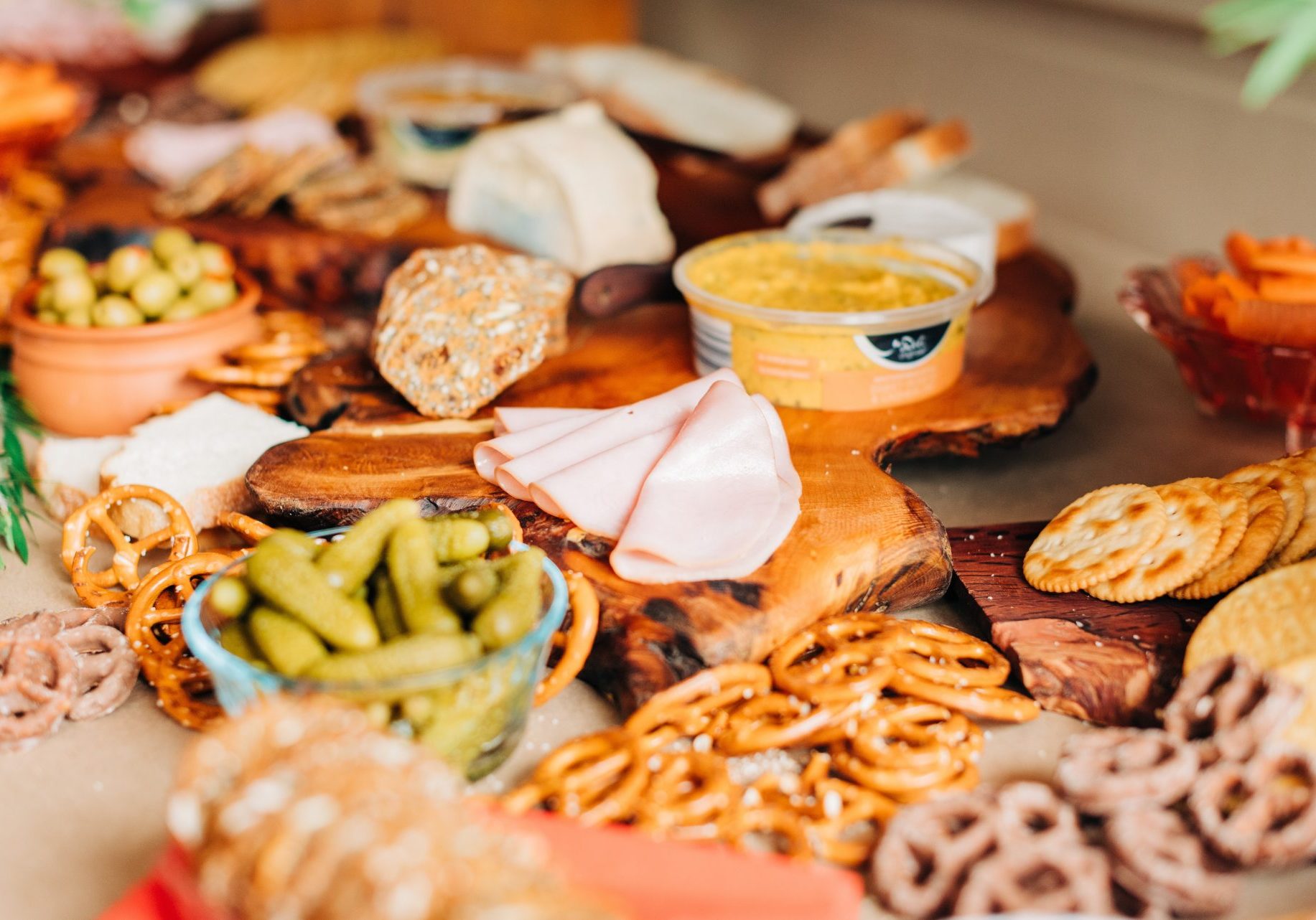 wooden plate with cold snacks